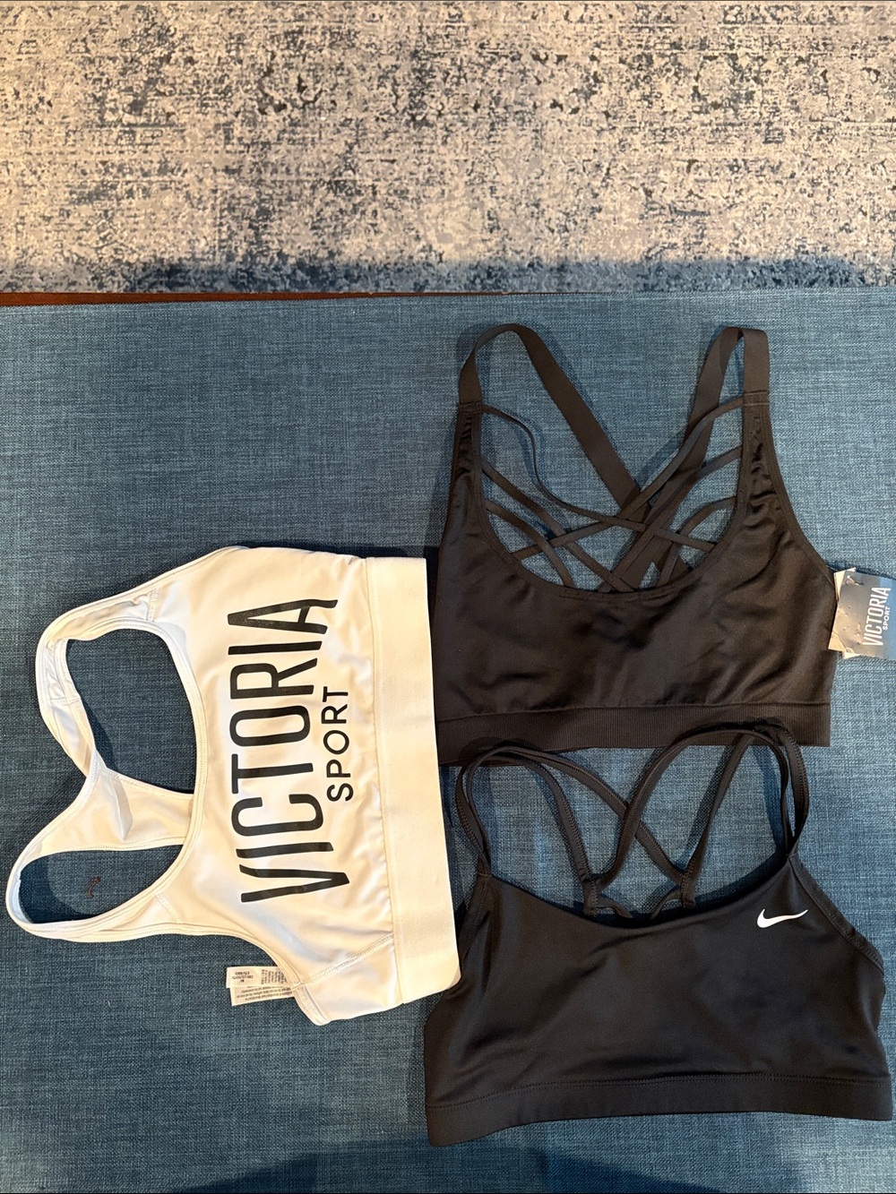 4 sport bras. Nike & 2 Victoria Sport. Under Armour.